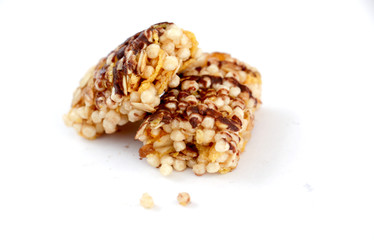 Healthy cereal bars with nuts isolated on white background
