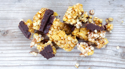 Healthy cereal bars on wood background