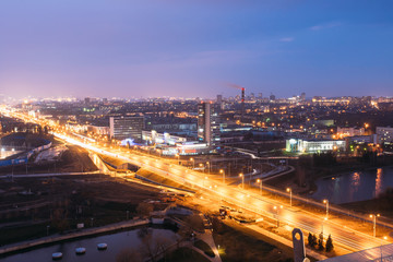 Fototapeta na wymiar Minsk, Belarus. Aerial View Cityscape In Bright Blue Hour Evening