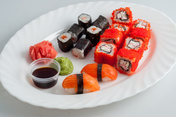 Japan food roll sushi set on a white plate