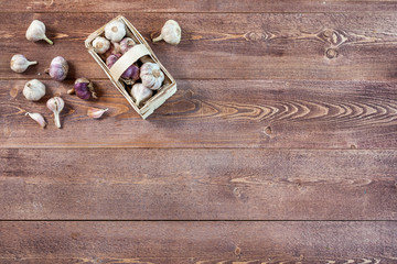 Garlic. Garlic Cloves and Garlic Bulb on a wooden vintage rustic table. Top View. Copy Space