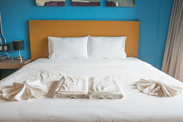 white pillow and bed.