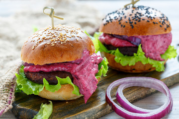 Homemade burger with berry sauce.