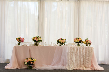 Head table for the newlyweds at the wedding hall