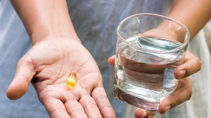 Women eating fish oil