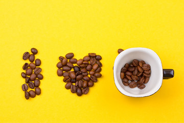 A cup of coffee and heart of the beans