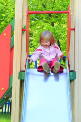 happy girl plays on the chidish hill