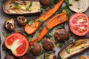 Various vegetables baked in the oven at home kitchen