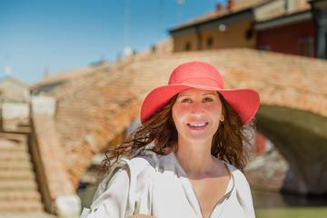 Beautiful tourist in Italian village