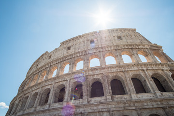 Fototapeta premium The Colosseum, an oval amphitheatre in the center of the city of Rome, Italy. It is the famous landmark built of concrete and sand.