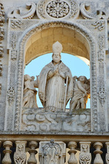 Fototapeta premium Detail of Sant'Oronzo statue on Lecce Cathedral, Apulia, Italy