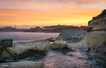 Sliema shoreline with Fort Manoel at beautiful sunset. Malta