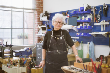 Art Jeweler Working in Studio