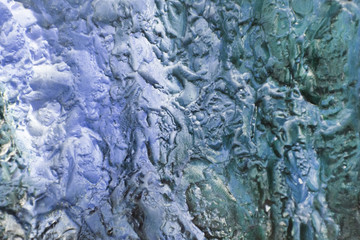 Interesting blue texture of blown paint