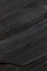 Dark grey black slate background or texture.