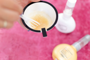 Woman prepareing hair care mask