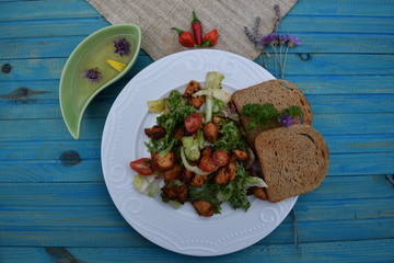 Fresh vegetable salad, healthy food, tomatoes and salad leaves. Healthy chicken salad with fresh vegetables