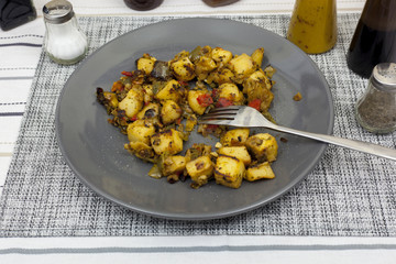 Plate of mediterranean vegetables on the dinner table