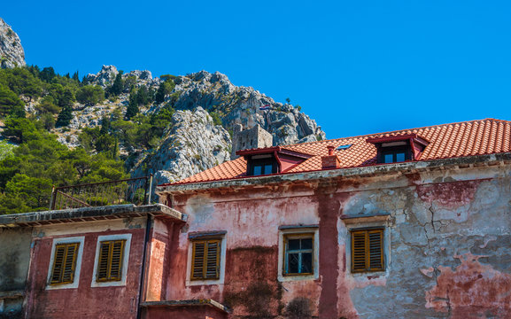 Historic view at famous romanesque landmark fortress Mirabela above town Omis, Dalmatia region, Croatia. 