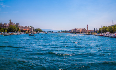 Fototapeta premium Picturesque scene of boats in a quiet bay, Croatia
