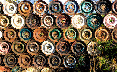 Industrial Urban Rusty Wheels Hubcaps Fence