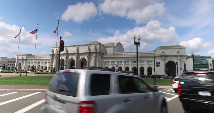 WASHINGTON, D.C. - Circa August, 2017 - A side view perspective driving past Union Station on Washington DC's Capitol Hill.  	