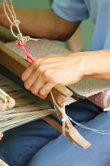 Close Up Of Asian Man Hand Weaving