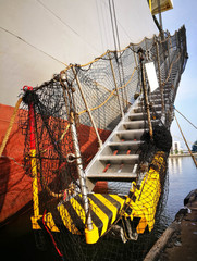 Hull Of A Freight Vessel With Ladder