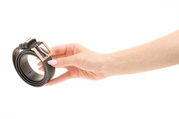 Female belt in a female hand 