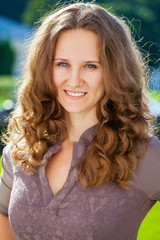 Portrait of beautiful young happy woman