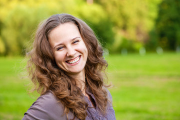 Portrait of beautiful young happy woman