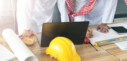 Business arabic team mates working together In the officee,Equipment construction engineers on the...