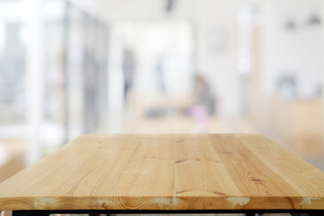 Empty wood table space platform and blurred office background. Product display montage Concept.
