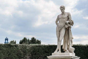 Fototapeta na wymiar A classic sculpture at Musee du louver Q park in Paris, France