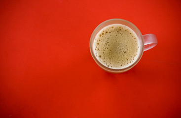 Tea with in a mug or popularly known as Teh Tarik isolated in white view from top.