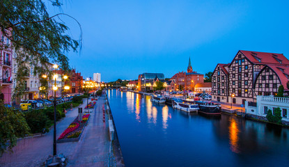 Old Town and granaries by the Brda River at night. Bydgoszcz. Poland - obrazy, fototapety, plakaty
