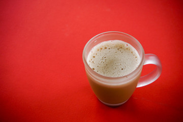 Tea with in a mug or popularly known as Teh Tarik isolated in white view from top.