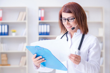 Woman doctor in telemedicine concept