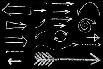 set of hand drawn chalk arrows isolated on black background