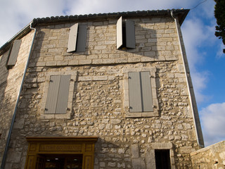 Old row houses with shutters, Arles, France
