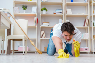 Man doing cleaning at home