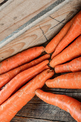 Carrot on wooden surface