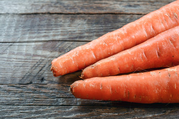 Carrot on wooden surface
