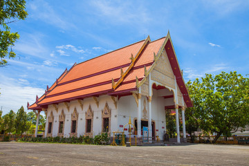 a golden Buddha image interred up to the cheat in Wat Phra Thong temple Phuket.