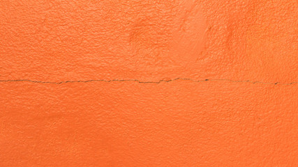Orange cement wall abstract background.