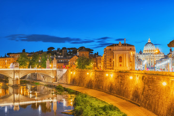 View on Bridge Vittorio Emanuele II (Ponte Vittorio Emanuele II) and Vatican city St. Peter's Basilica (Basilica di San Pietro) . Rome. Italy.