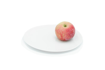 Ripe apple on a plate