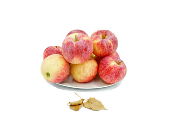Ripe apples on a plate