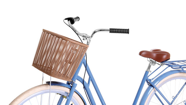 Fototapeta Bicycle with wicker basket on white background