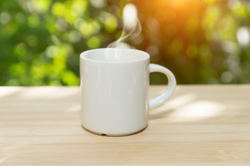 White coffee cup in the morning time
